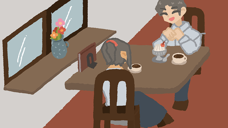 カフェで話し込むふたり
